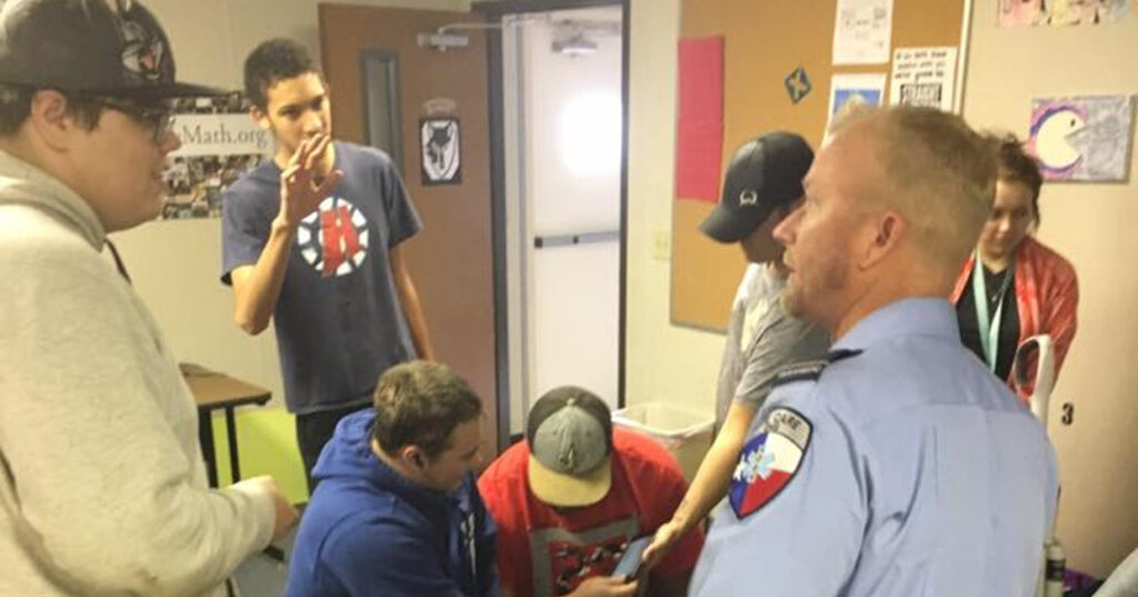 Crosstimbers Academy Students Congregate and Chat with a local EMT