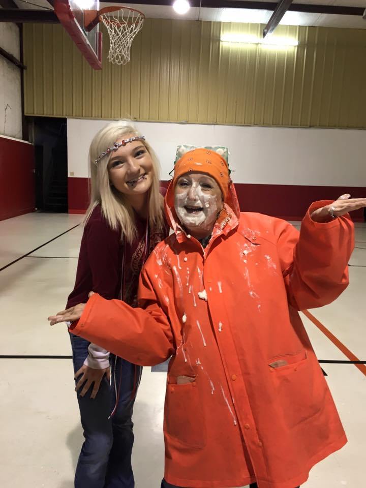 Crosstimbers Academy Student and Teacher Enjoying a Pie to the Face