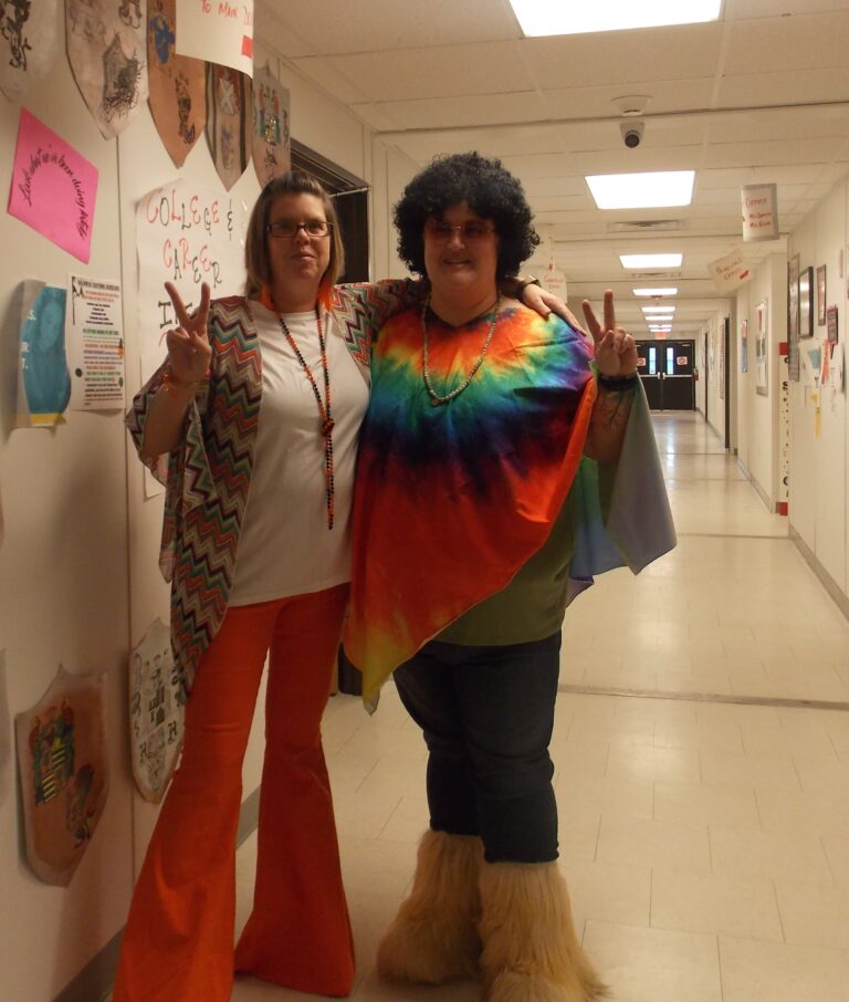 2 Crosstimbers Academy students dressed in 70s outfits